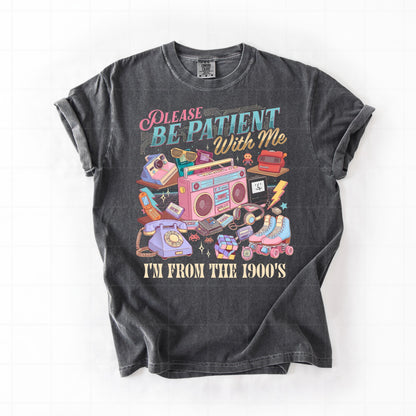 Black t-shirt with 1990s-themed graphic and text on a white background