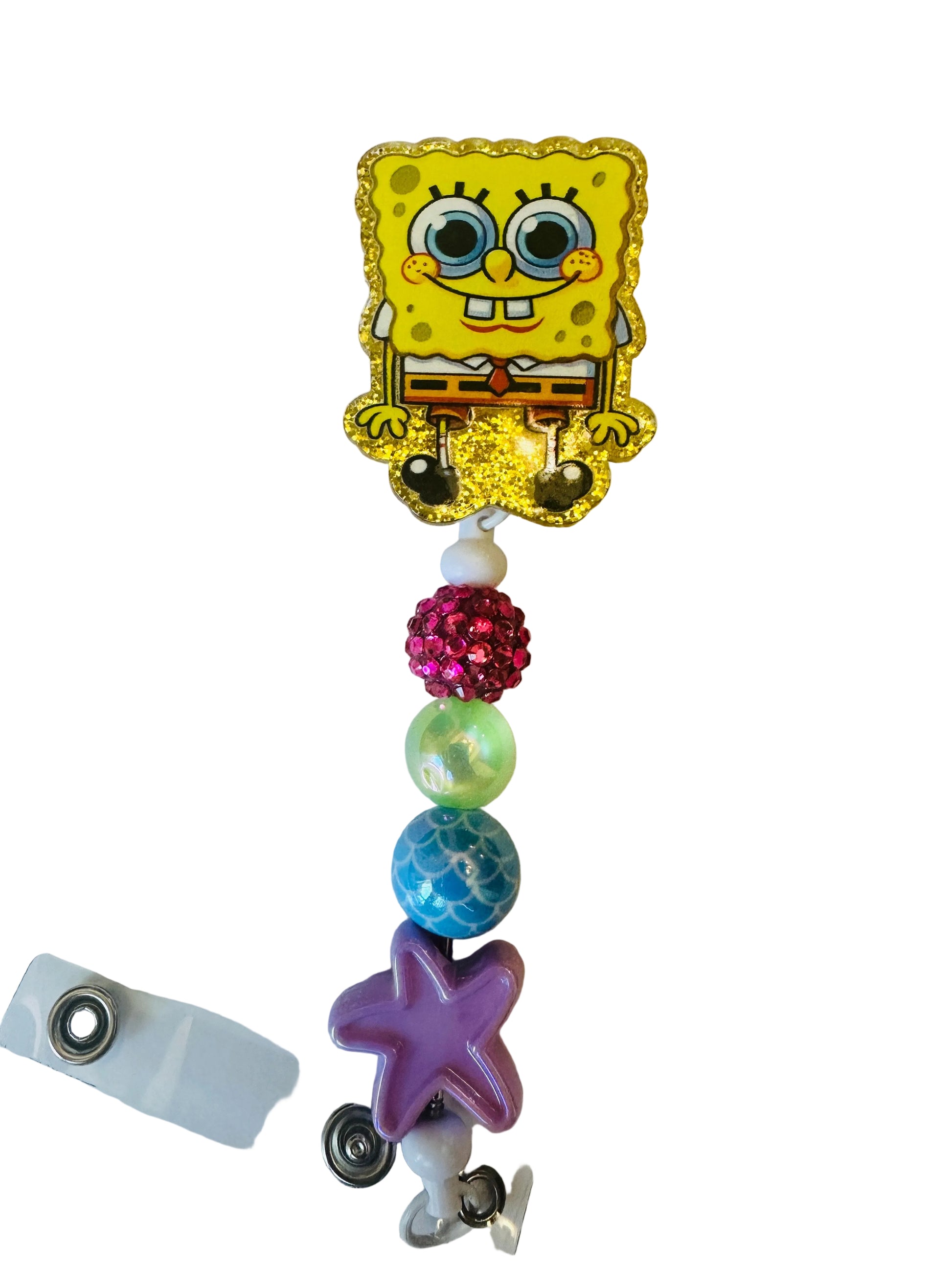 Colorful badge holder with a cartoon character and beads on a white background