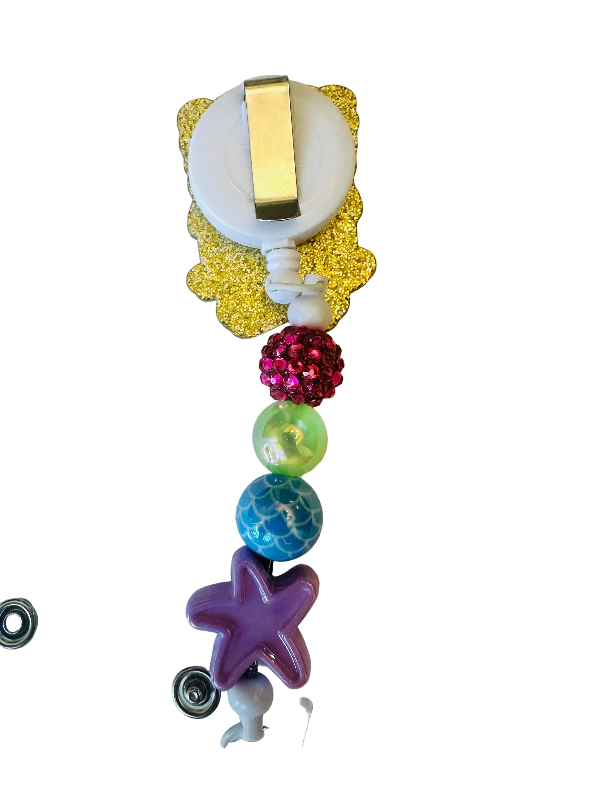Colorful badge holder with beads and a starfish charm on a white background