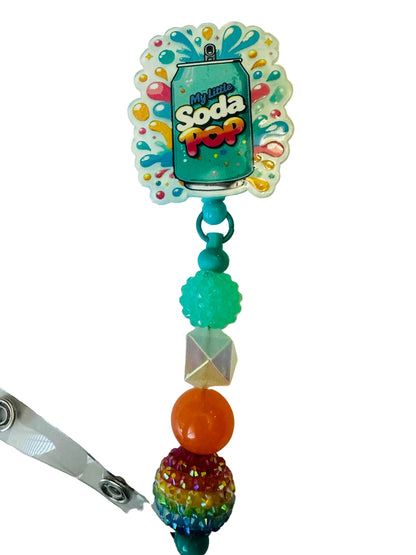 Colorful 'Soda Pop' badge holder with beads on a white background