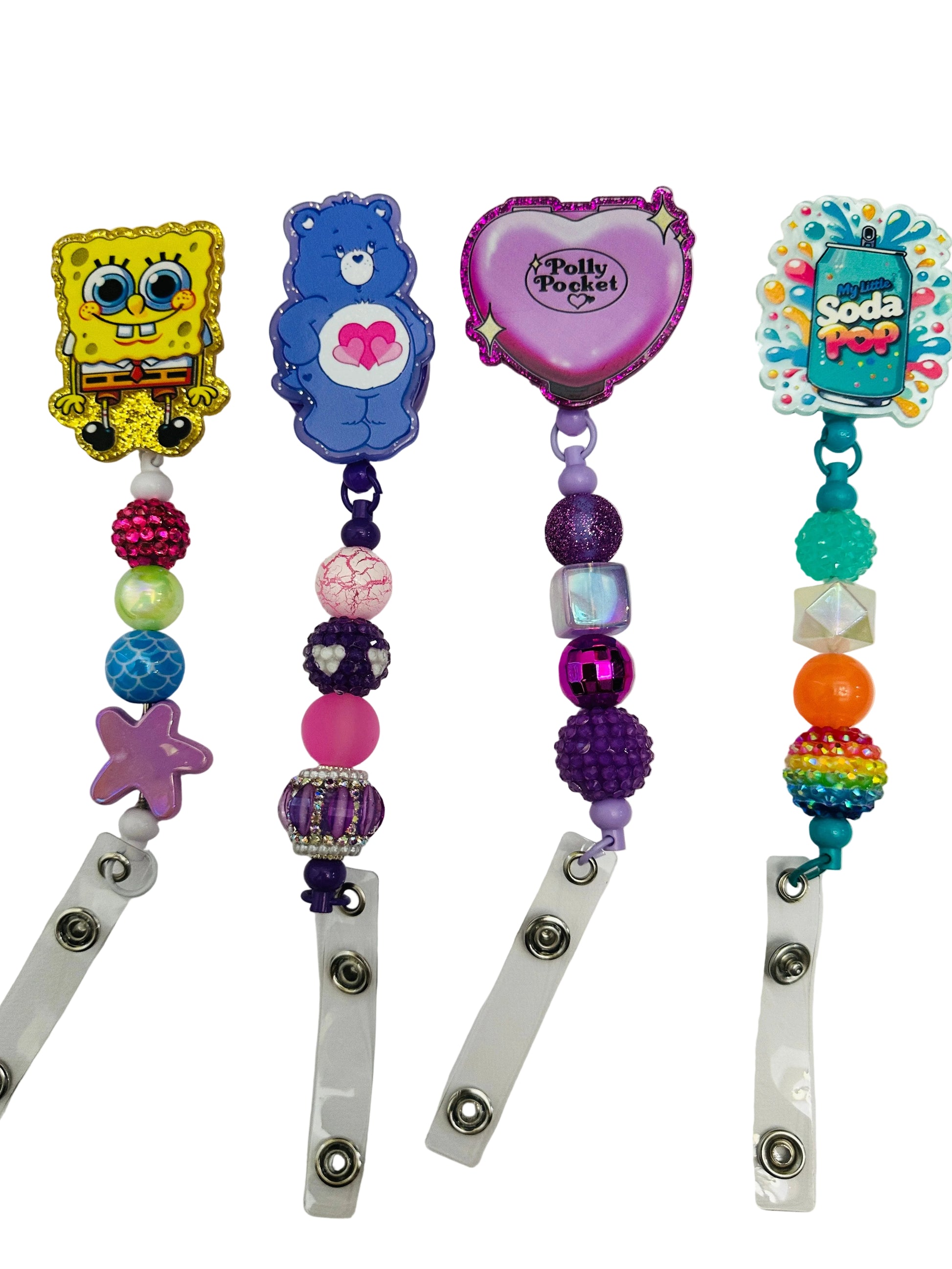 Four colorful badge holders with cartoon characters on a white background